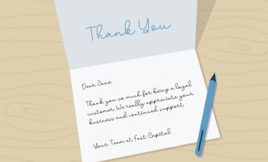 Beige background with a handwritten thank-you card and a pen.