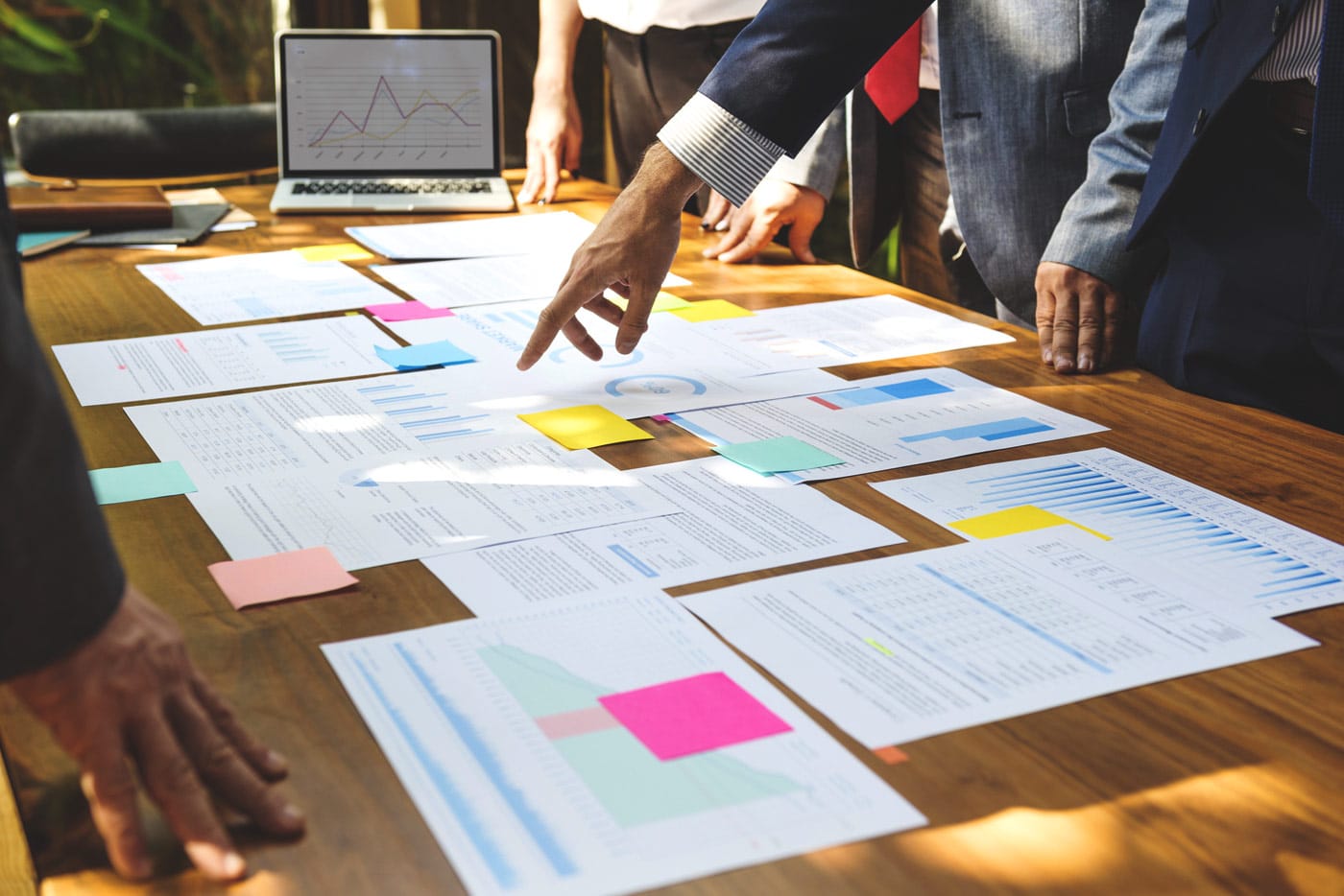 Coworkers review business plans during a meeting