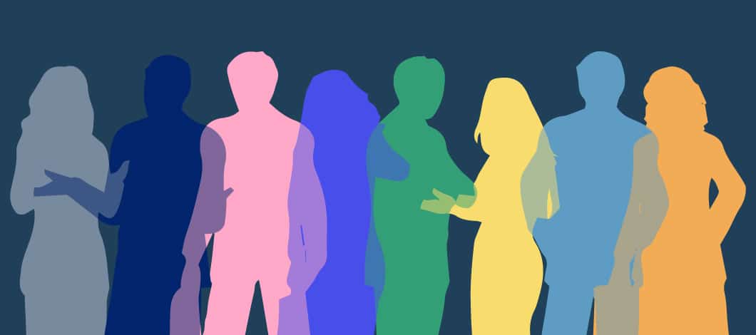 Silhouettes of men and women in an array of rainbow colors represent diversity in this concept illustration.