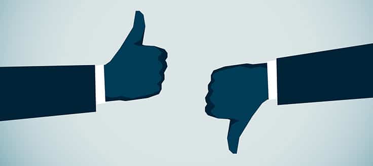 Illustration of one person giving the thumbs up and another person giving the thumbs down.