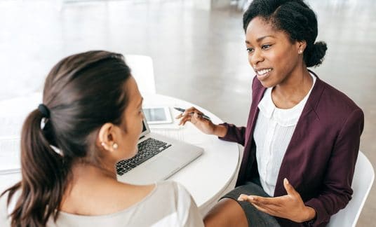 A business consultant and a woman meeting. 