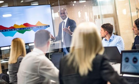 A man makes a presentation to find investors for his small business.