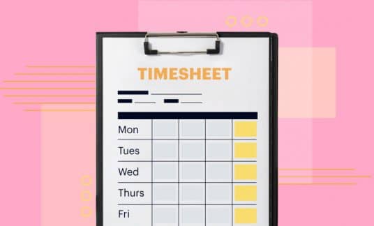 A timesheet is attached to a clipboard. Use a timesheet template to trackable employee hours.