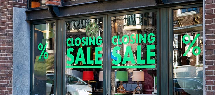 A store has “closing sale” notices stenciled on its front doors. A business can divest a location that’s underperforming.