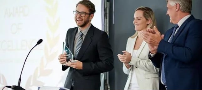 Publicly recognizing your employees' achievements is one way to keep employees happy in the workplace.