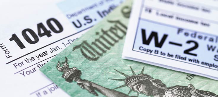 Tax documents, including a 1040 and W-2 form