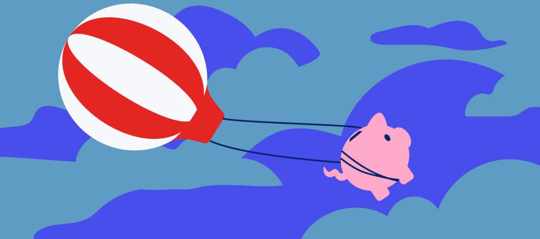 Piggy bank attached to hot air balloon