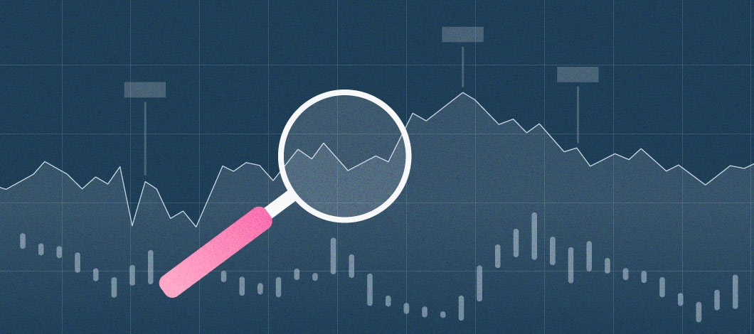 Magnifying glass looking at chart