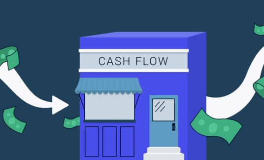 Image of a building with the words “cash flow” on it, with arrows before and after the building and dollar bills flying all around