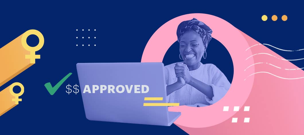 A woman works at her laptop and sees that she’s been approved for a small business loan for women.