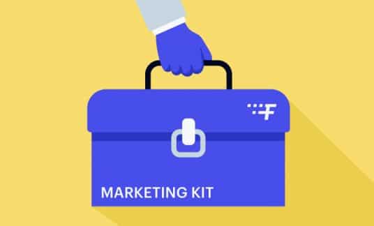 Person holding marketing kit toolbox