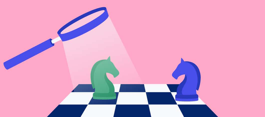 A magnifying glass inspects a chess board with two opposing knights.