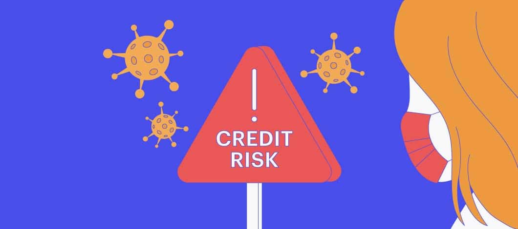 A hazard sign labeled “Credit Risk” is surrounded by the COVID-19 virus.