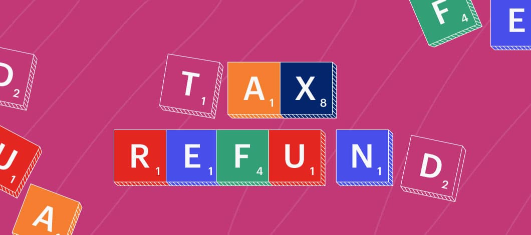 Word tiles spell out “tax refund.”
