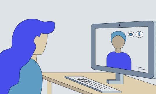 An employer interviews a job candidate who appears on her computer screen.