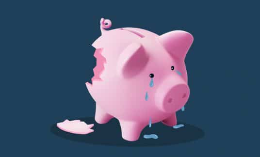 A broken piggy bank sheds tears.