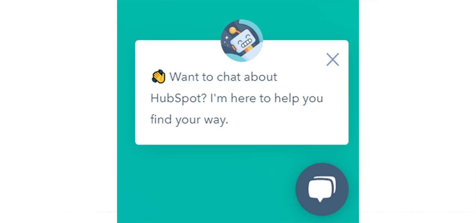 HubSpot chatbot with face of a cartoon robot at the top and the question “Want to chat about HubSpot?” below.