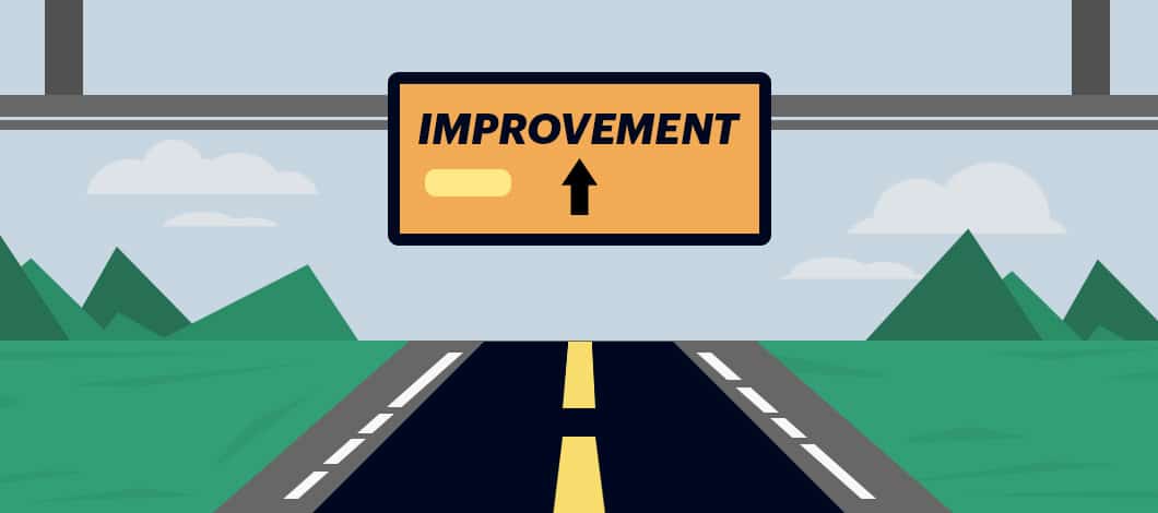There is a sign along a road that reads “Improvement.”