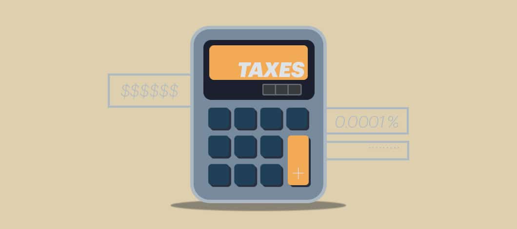 A calculator’s screen reads “Taxes.”
