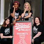 Photo of entrepreneur Leslie Polizzotto and her team at The Doughnut Project.