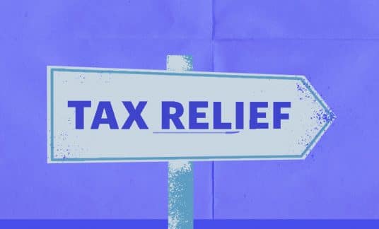 A sign points the way to “Tax Relief.”