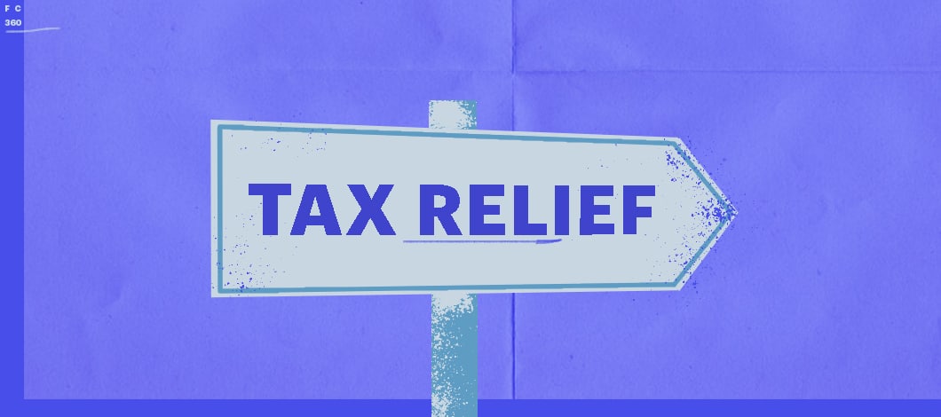 A sign points the way to “Tax Relief.”