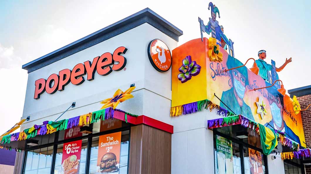 A Popeyes restaurant promotes Mardi Gras.