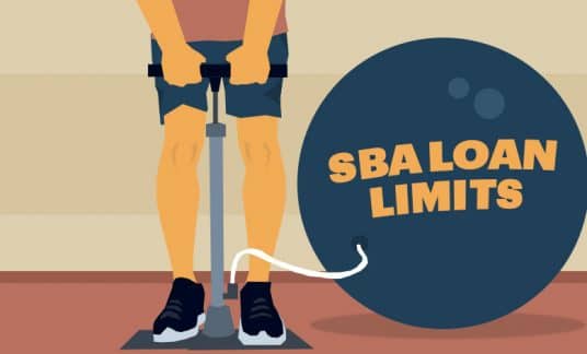 A person uses a bike pump to pump up a big inflatable ball that reads, “SBA Loan Limits.”