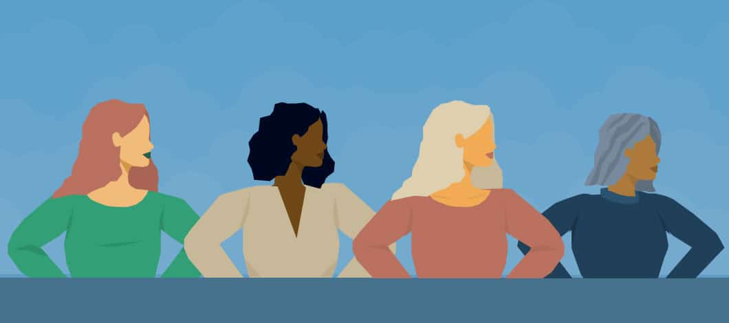 Successful female entrepreneurs: Four women of different colors, backgrounds and ages stand triumphantly side by side.