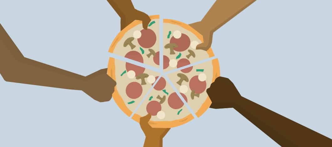 Five different hands reach to a pizza pie that is cut five ways. (Everyone is getting a slice of pie.)