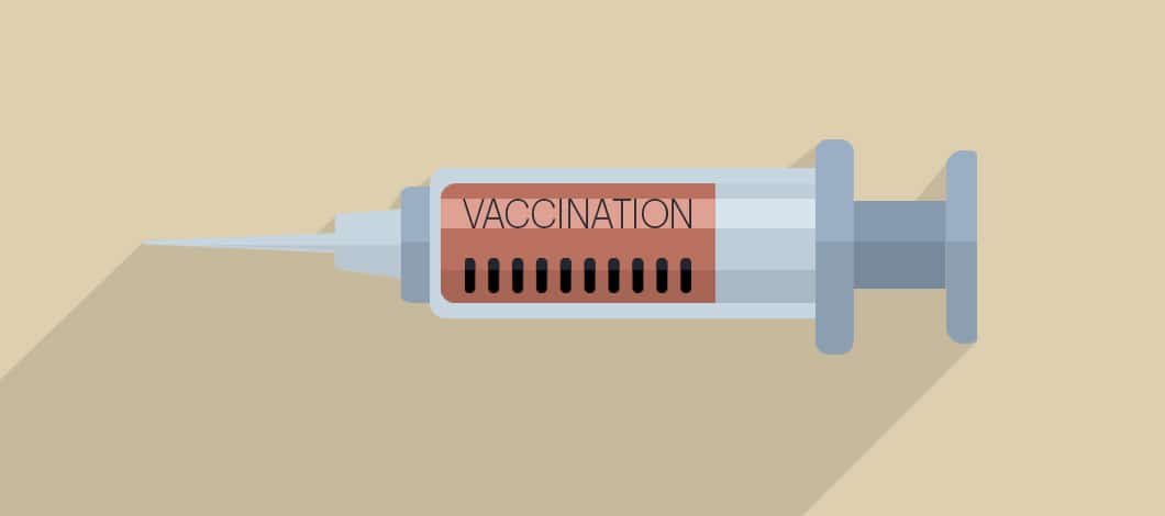 This is a close-up of a syringe labeled “Vaccination.”