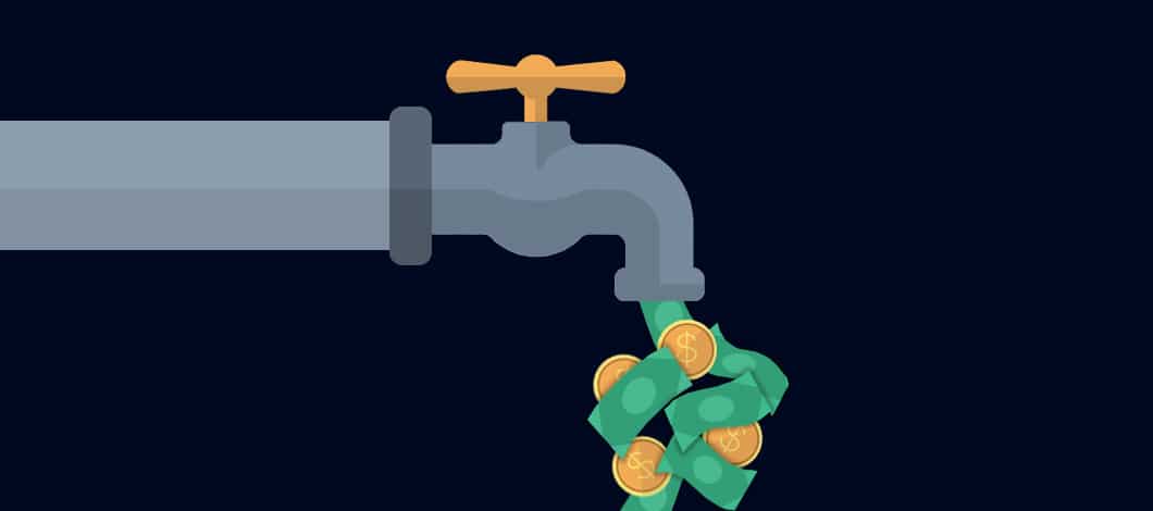 Dollar bills and coins flow from a water faucet.