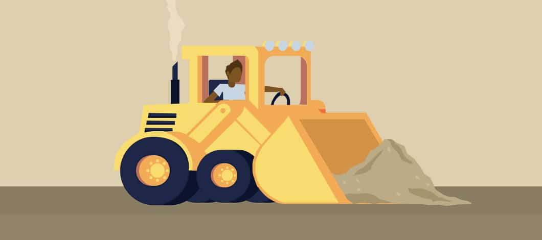 A person operates a bulldozer.