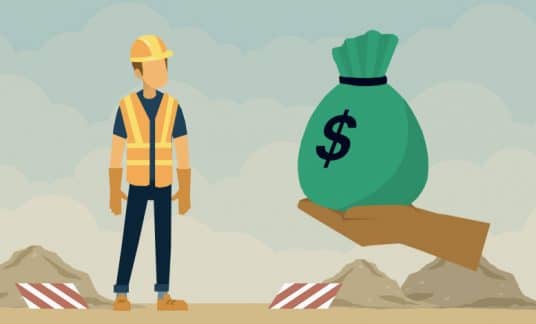 A hand extends a sack of cash marked with a dollar sign to a construction worker at a job site.