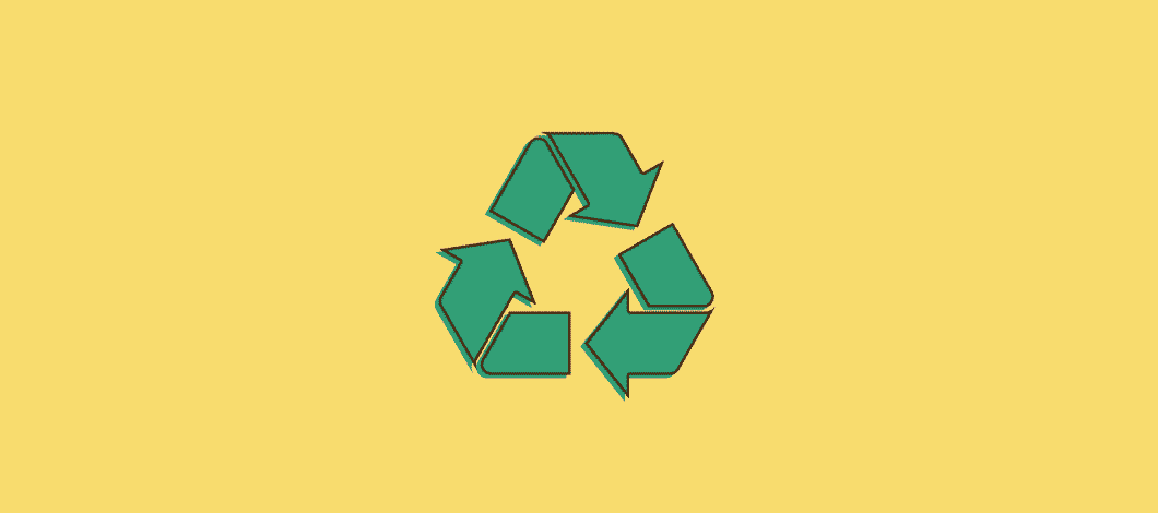 Sustainable packaging materials surround the recycling symbol.
