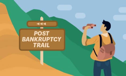 A hiker hold binoculars is about to embark on a steep climb uphill. The path is marked with a sign that reads “Post Bankruptcy Trail.”