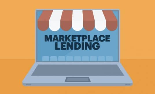 A computer laptop has a small shop awning on it. The screen reads “Marketplace Lending.”