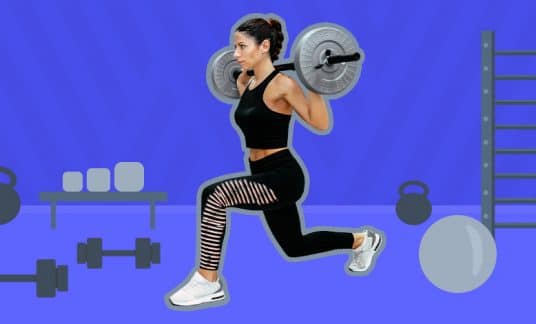 A woman does squats with weights in an exercise room.