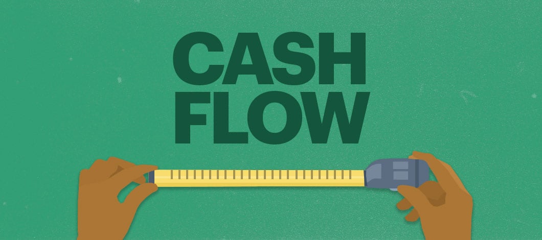 Hands holding measure tape measure the words “Cash Flow.”