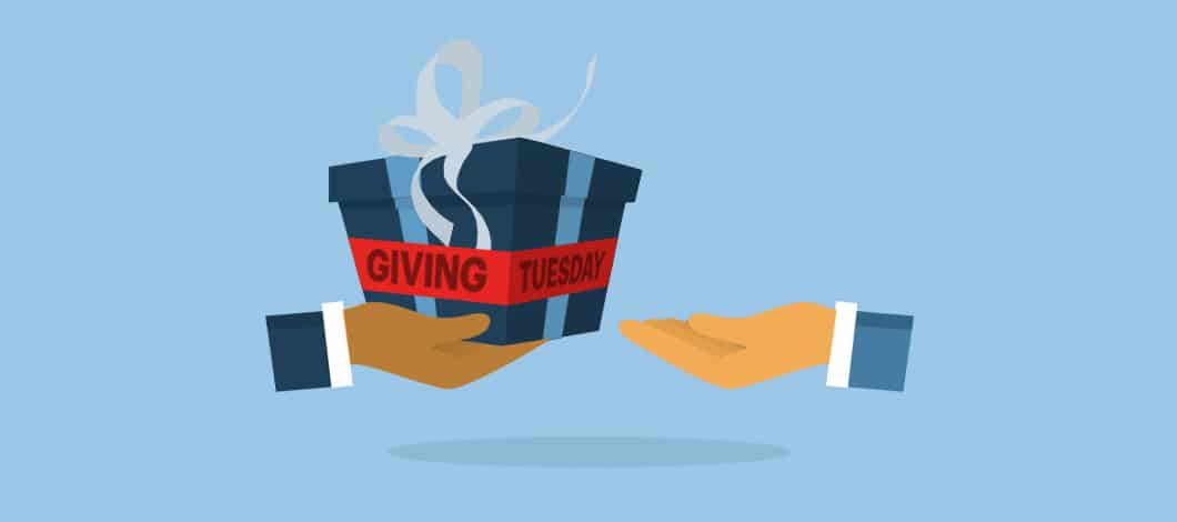 One hand reaches out to give a gift box labeled “Giving Tuesday” to another hand.
