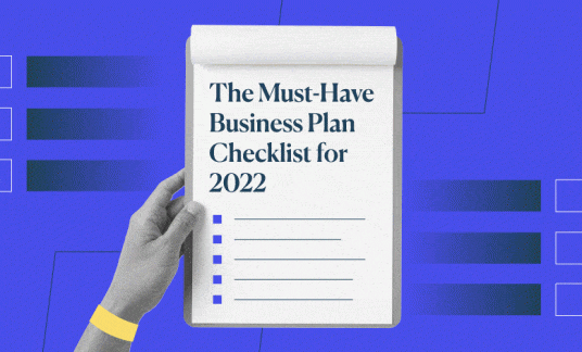 Hand holding the Must-Have Business Checklist for 2022