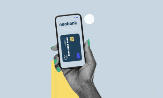 Moving image of a hand holding a mobile phone with the word “neobank” on the screen with a credit card image on it